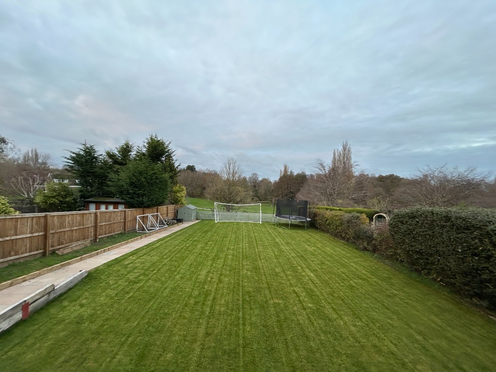 Well-maintained striped lawn from a recent customer in Lakeside, Swindon
