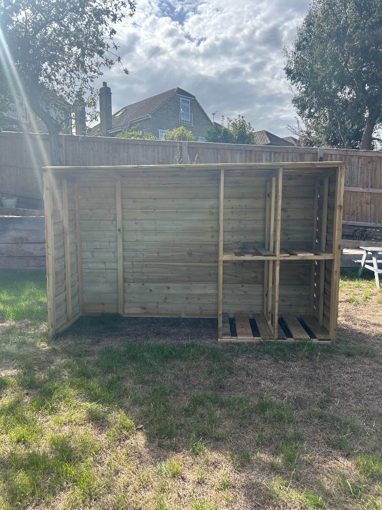 Handmade wooden bin shed with 4 boxes