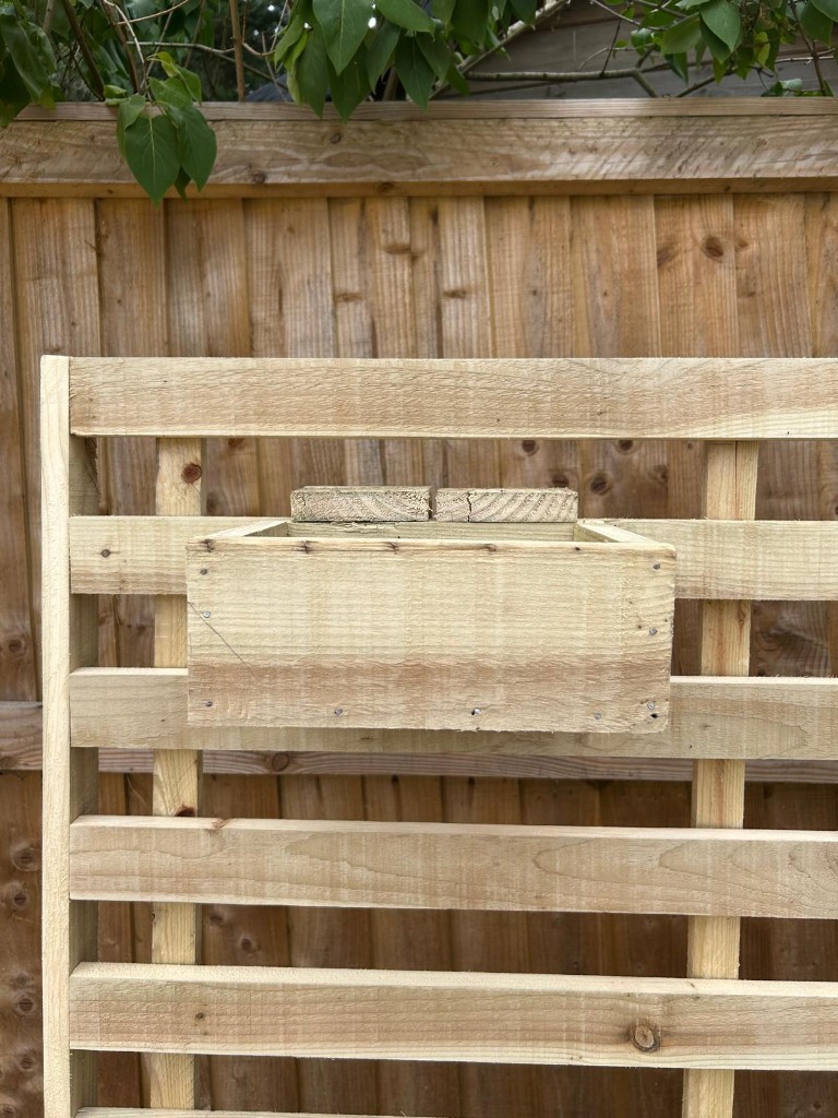 Flower box for privacy wall